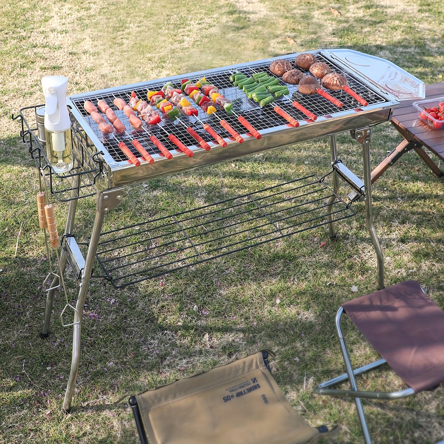 Portable Stainless Steel Folding Barbecue Grill With Tool Set Including Forks Shovels And Tongs Large Charcoal Grill With Side Tables And Condiment Storage Basket Ideal For Outdoor Cooking
